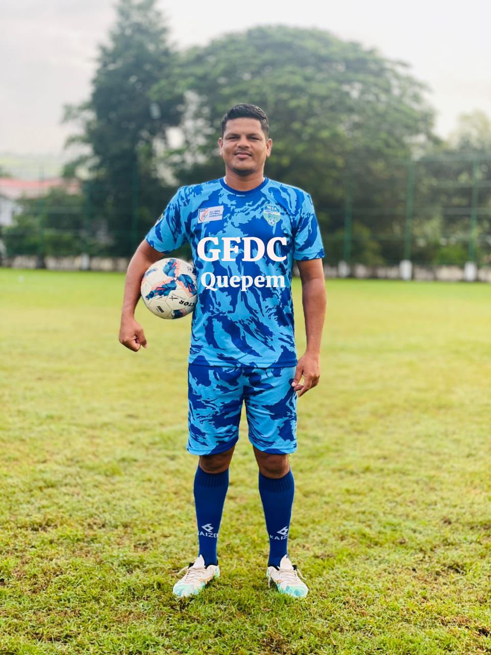Coach Melwin Joseph Fernandes leading a training session.
