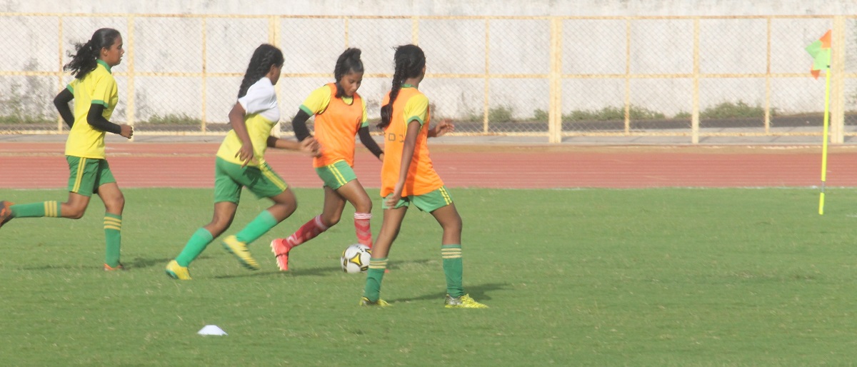 Girls in GFDC kit competing in a match.